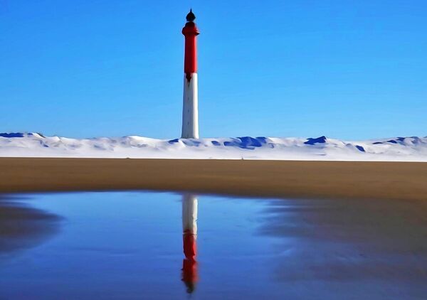 Le phare sous la neige, tableau phare rouge et blanc sous la neige